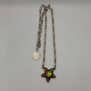 L'étoile sertie argent